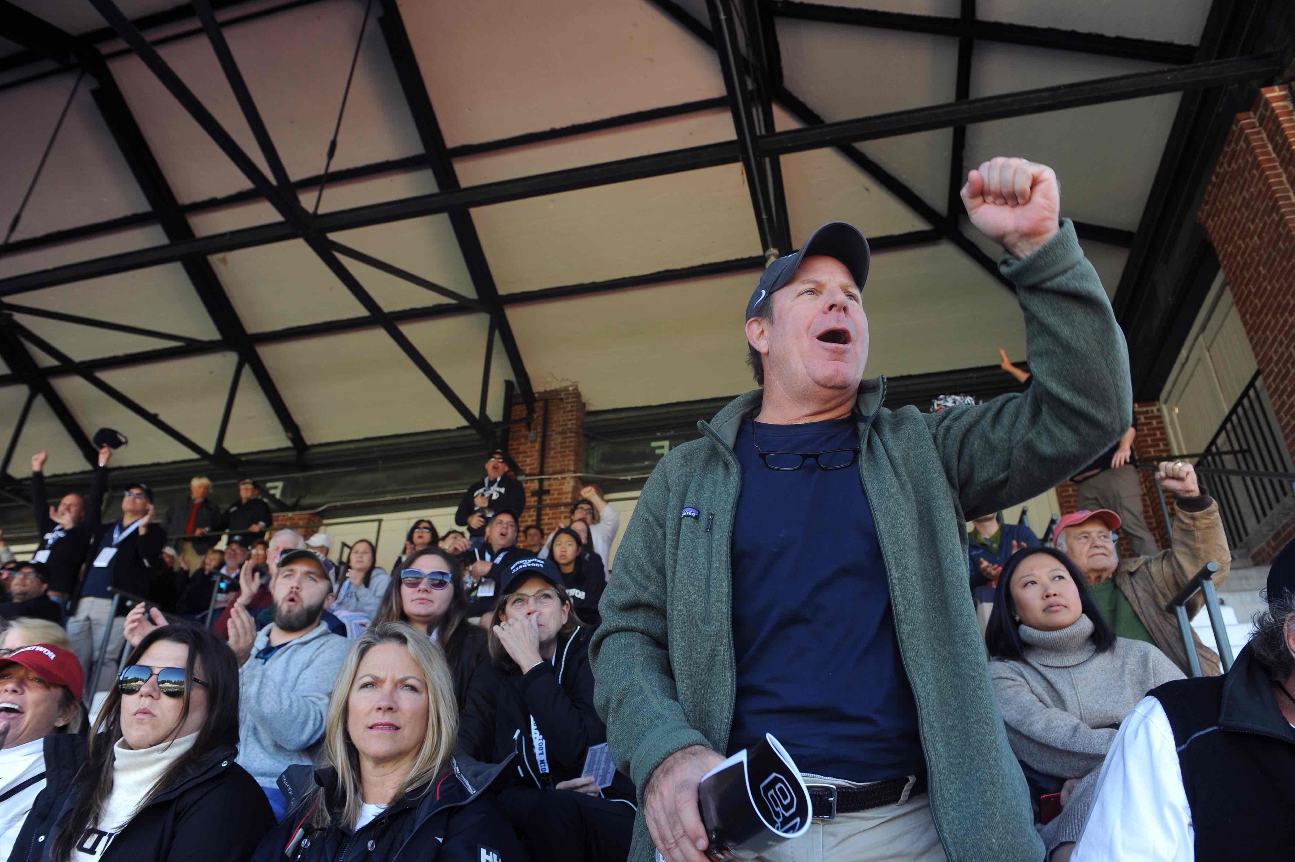 Fans cheering at Homecoming